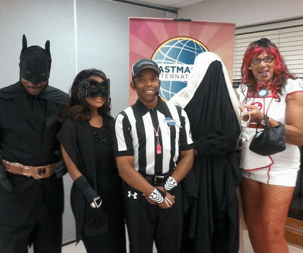 A group of people dressed up in costumes.